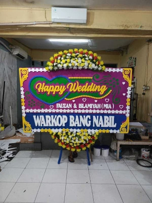 Papan Bunga di Uki Cawang